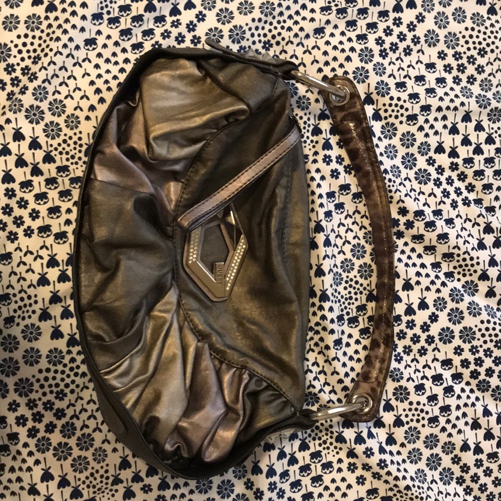 A guess purse.